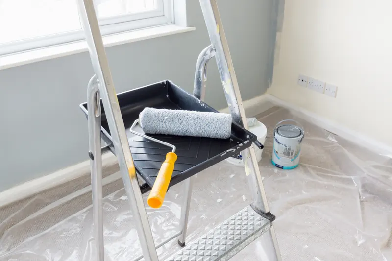 Room prepped and masked for painting
